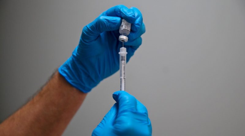 As Covid cases rise, CDC panel recommends new version of vaccine for fall
