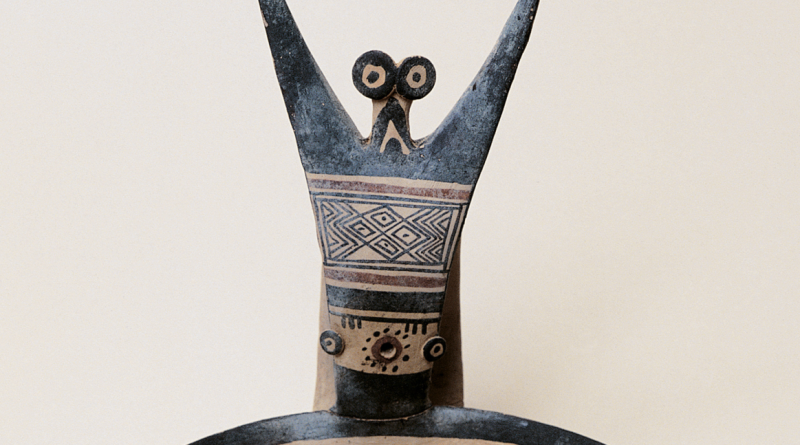 Daunian kyathos: A 2,700-year-old ceramic cup from Italy decorated with an exuberant-looking, bug-eyed fellow