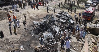Suicide car bombing attack on a train in Pakistan kills dozens